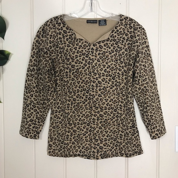 George Brown & Animal Cheetah Print Blouse
3/4 Sleeve
Large
77% Silk 23% Nylon - Picture 4 of 13